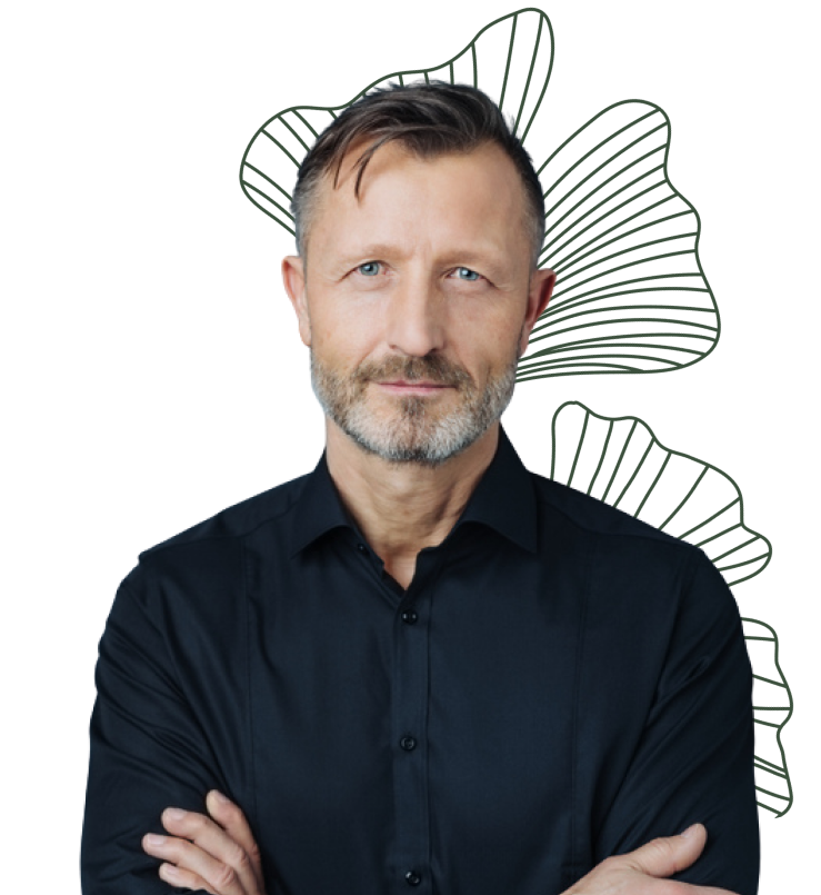 Confident middle-aged man with beard in black shirt standing with arms crossed