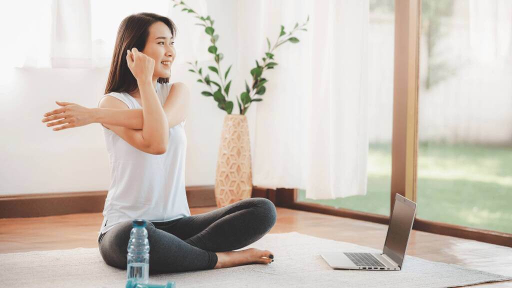 Person doing light stretches with a peaceful look