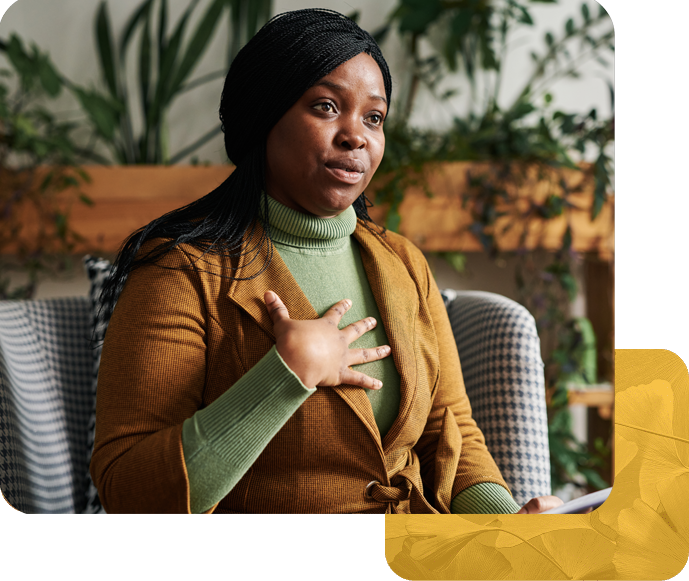 Woman sharing during trauma therapy session