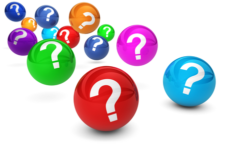 Colorful spheres with white question marks, symbolizing curiosity, uncertainty, or seeking answers