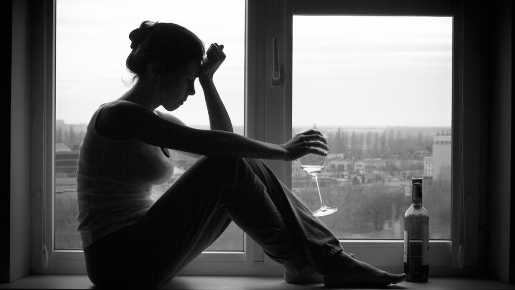 woman shame drinking